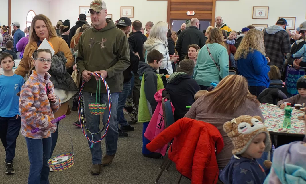 The was a crowd in the Zion Lutheran Church Fellowship Hall at the St. Croix Area Volunteer League 2024 Annual Easter Egg Hunt. Photo by Paul J. Seeling