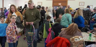 The was a crowd in the Zion Lutheran Church Fellowship Hall at the St. Croix Area Volunteer League 2024 Annual Easter Egg Hunt. Photo by Paul J. Seeling