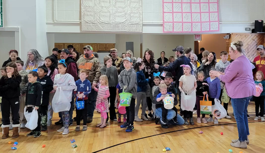 The kids and families waiting for their chance to grab some of those brightly colored plastic Easter eggs. Photo by Amy Bechel