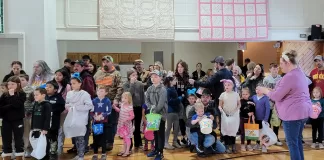 The kids and families waiting for their chance to grab some of those brightly colored plastic Easter eggs. Photo by Amy Bechel