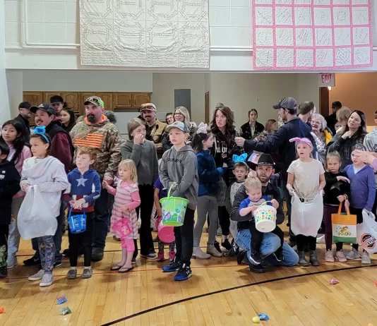 The kids and families waiting for their chance to grab some of those brightly colored plastic Easter eggs. Photo by Amy Bechel