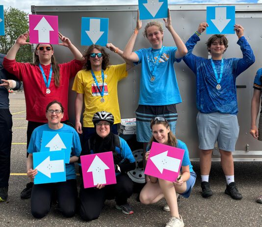 MS 150 riders cross the finish line